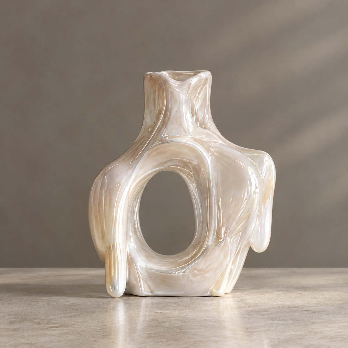 MARVOLM lava-flow open-oval sculptural vase clean product shot — large oval window, flowing lava arms, narrow neck opening, iridescent champagne pearl glaze, neutral background