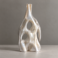 MARVOLM tall bone-inspired sculptural vase clean product shot — pearlescent glaze, vertical organic form against neutral background