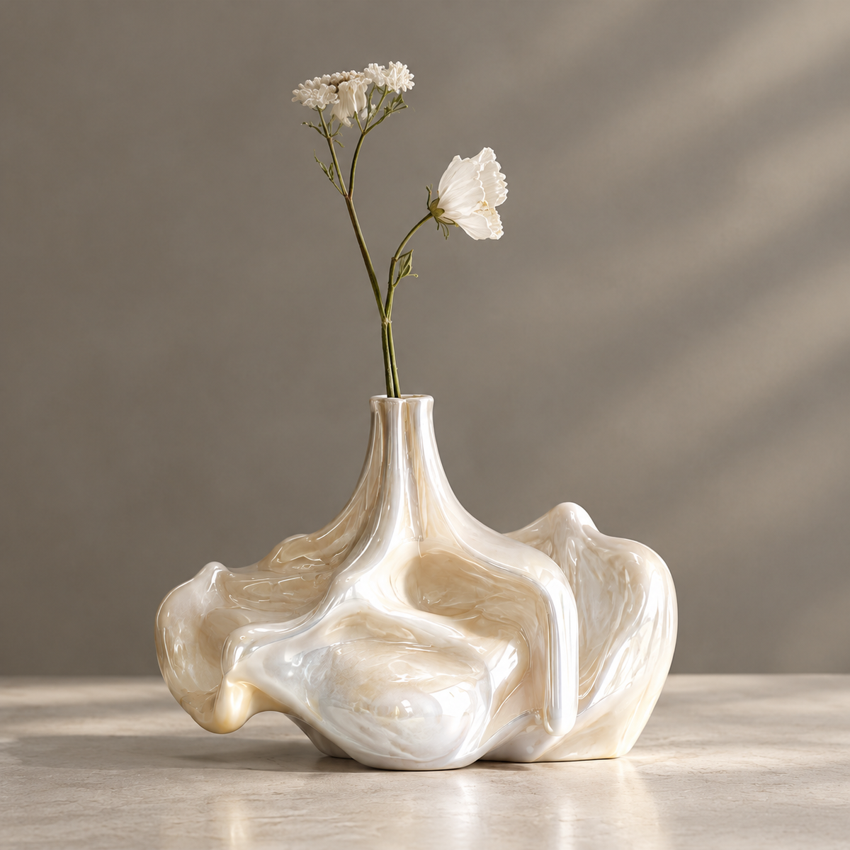 MARVOLM wide-cloud base narrow-neck sculptural vase clean product shot — dramatically wide organic base spreading horizontally, slender rising neck, iridescent pearl glaze, neutral background